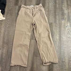 Tan Holsters wide leg cargo pants.
